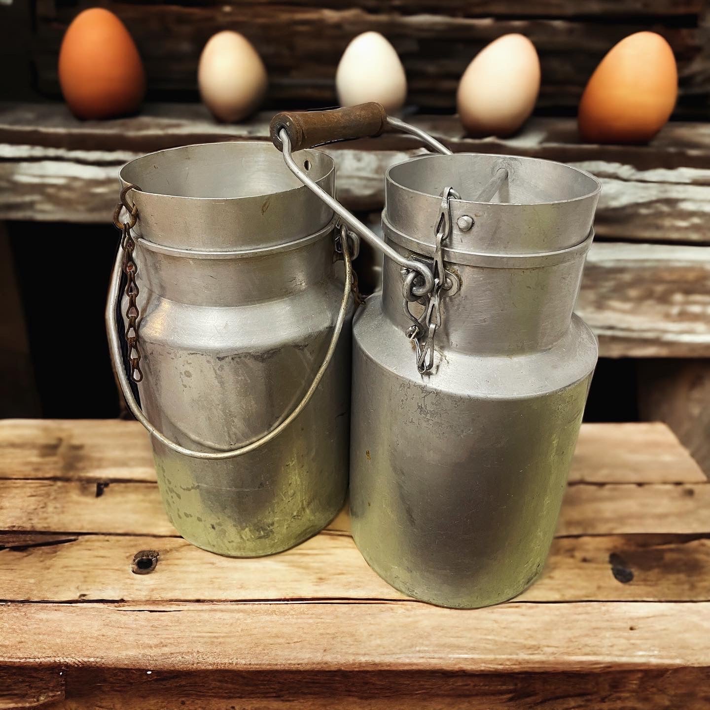 Pair of antique milk churns