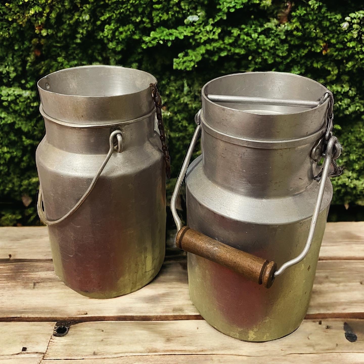 Pair of antique milk churns