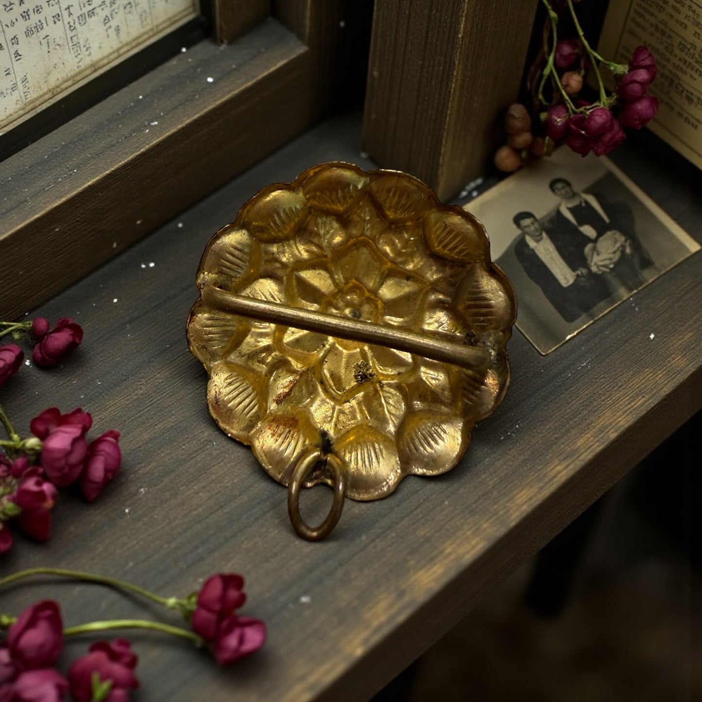 Pendente antico in princisbecco a guisa di fiore con molte corolle, utilizzabile anche come gioiello da abito, fine ‘800 - primo ‘900