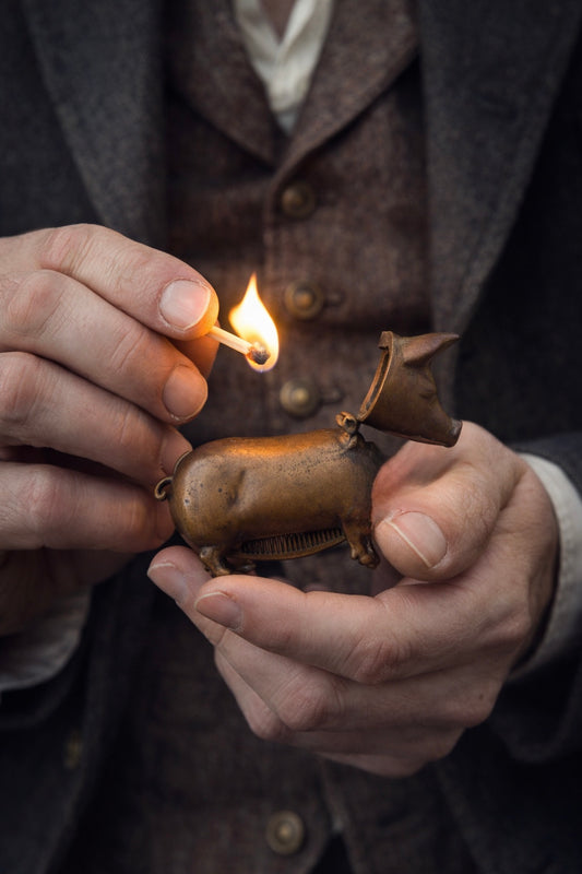 Vesta case a guisa di maialino in ottone pieno fine ‘800