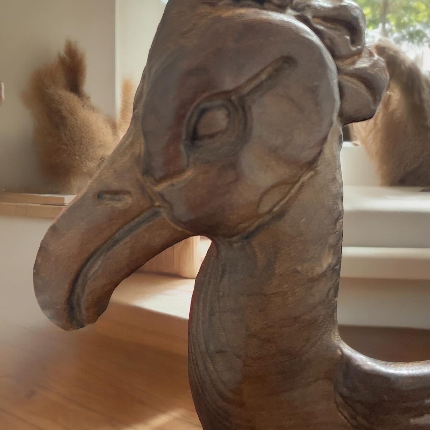 Wooden sculpture of a water bird