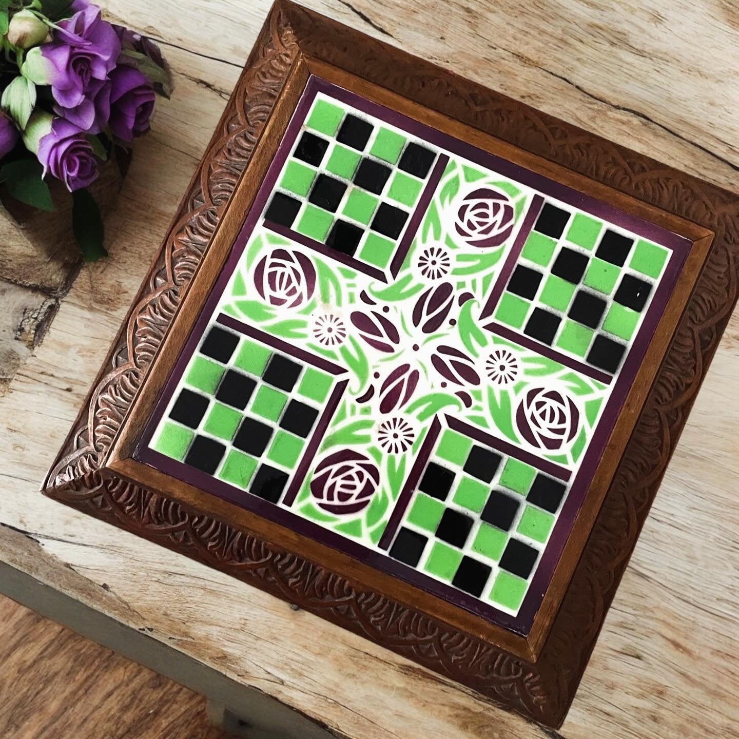 Art nouveau tile in wooden frame