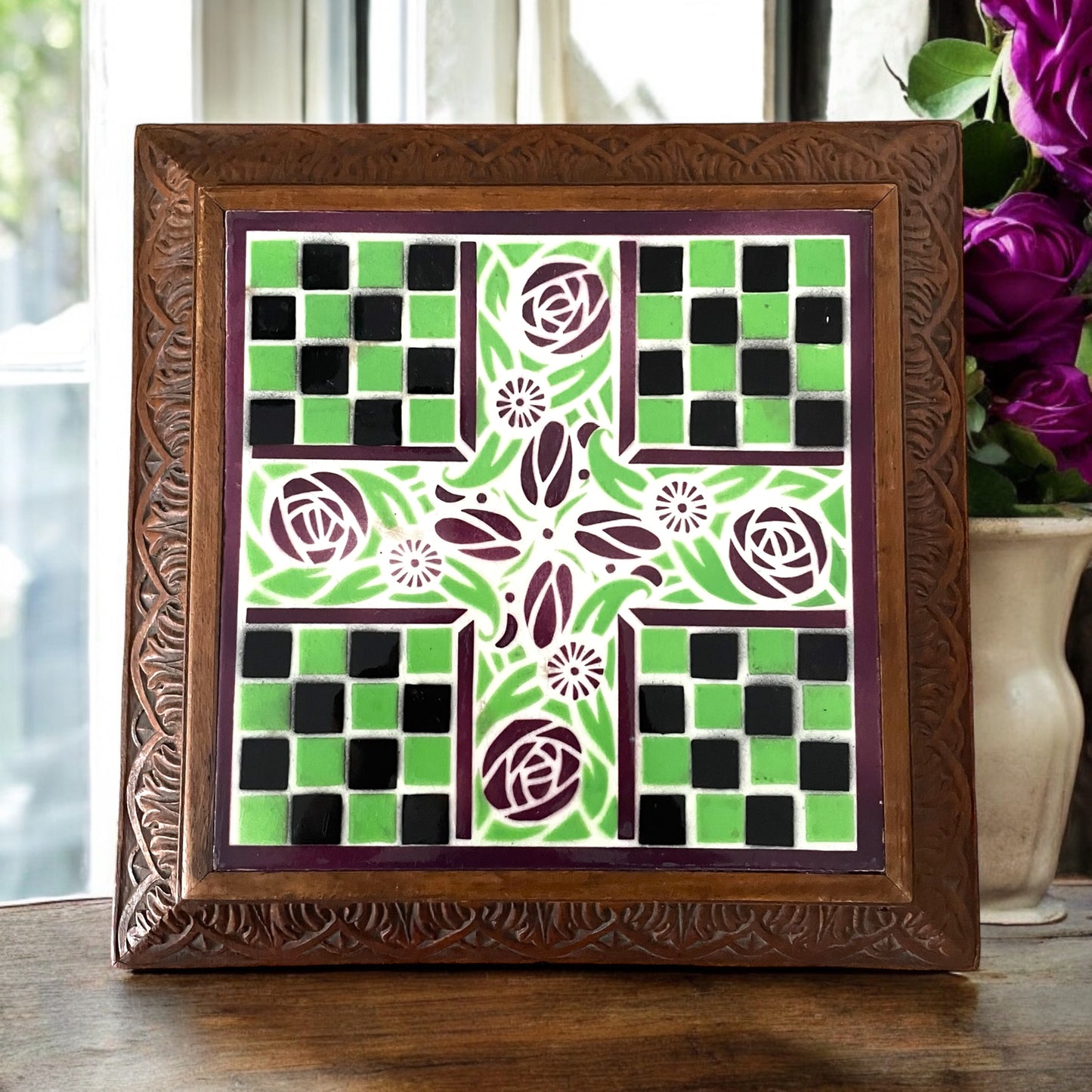 Art nouveau tile in wooden frame