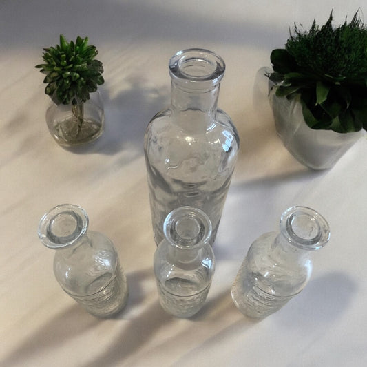 Set n. 4 bottiglie vintage da farmacia in vetro