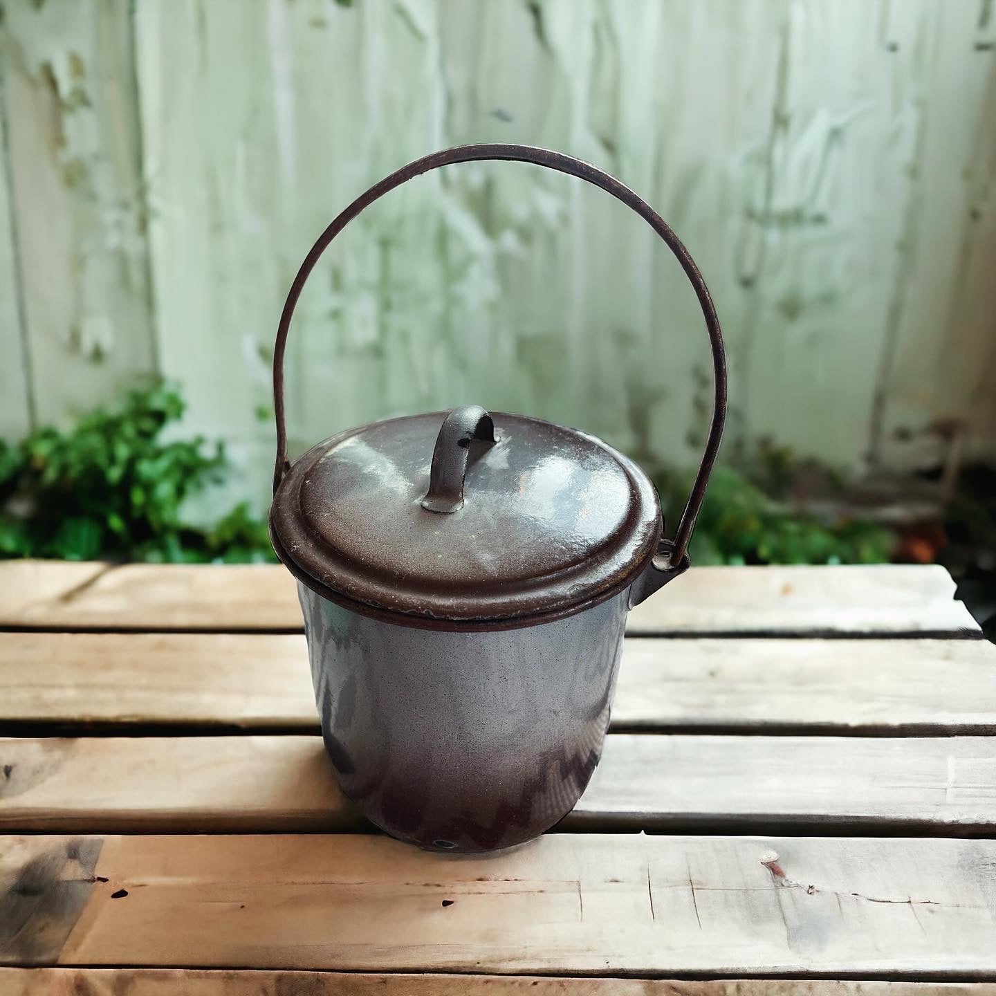 Set of three enameled saucepans and jug