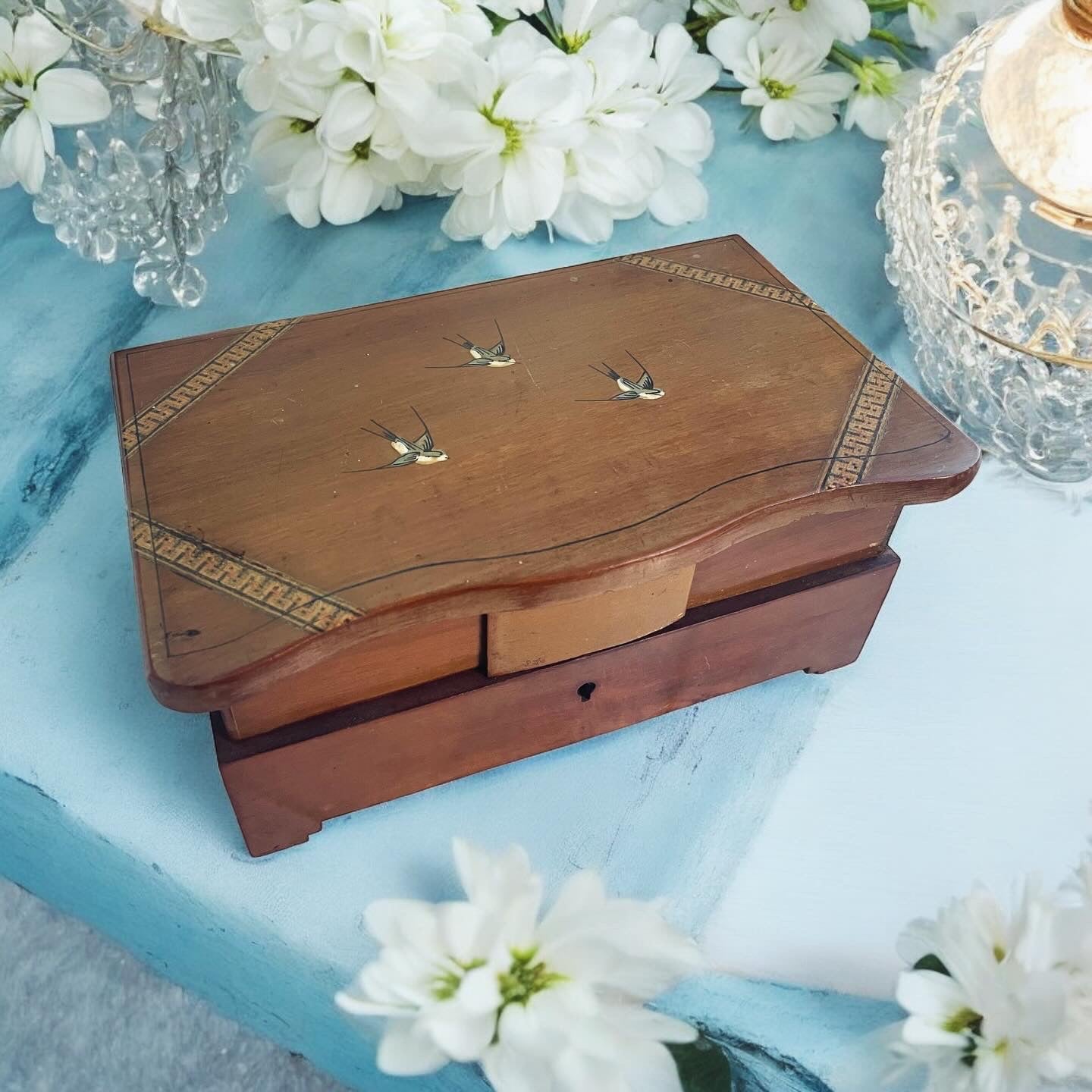 Padded jewelry box with swallows