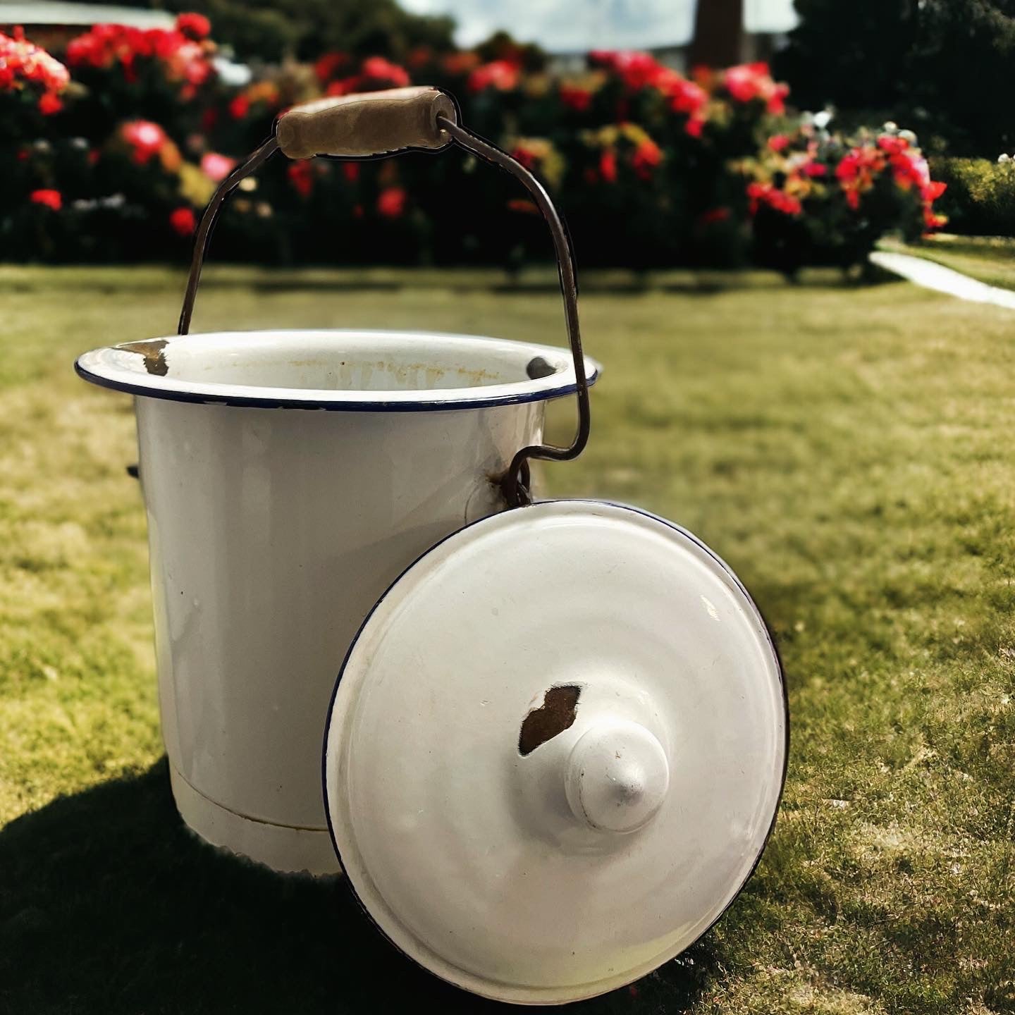 Antique enamel bucket with lid