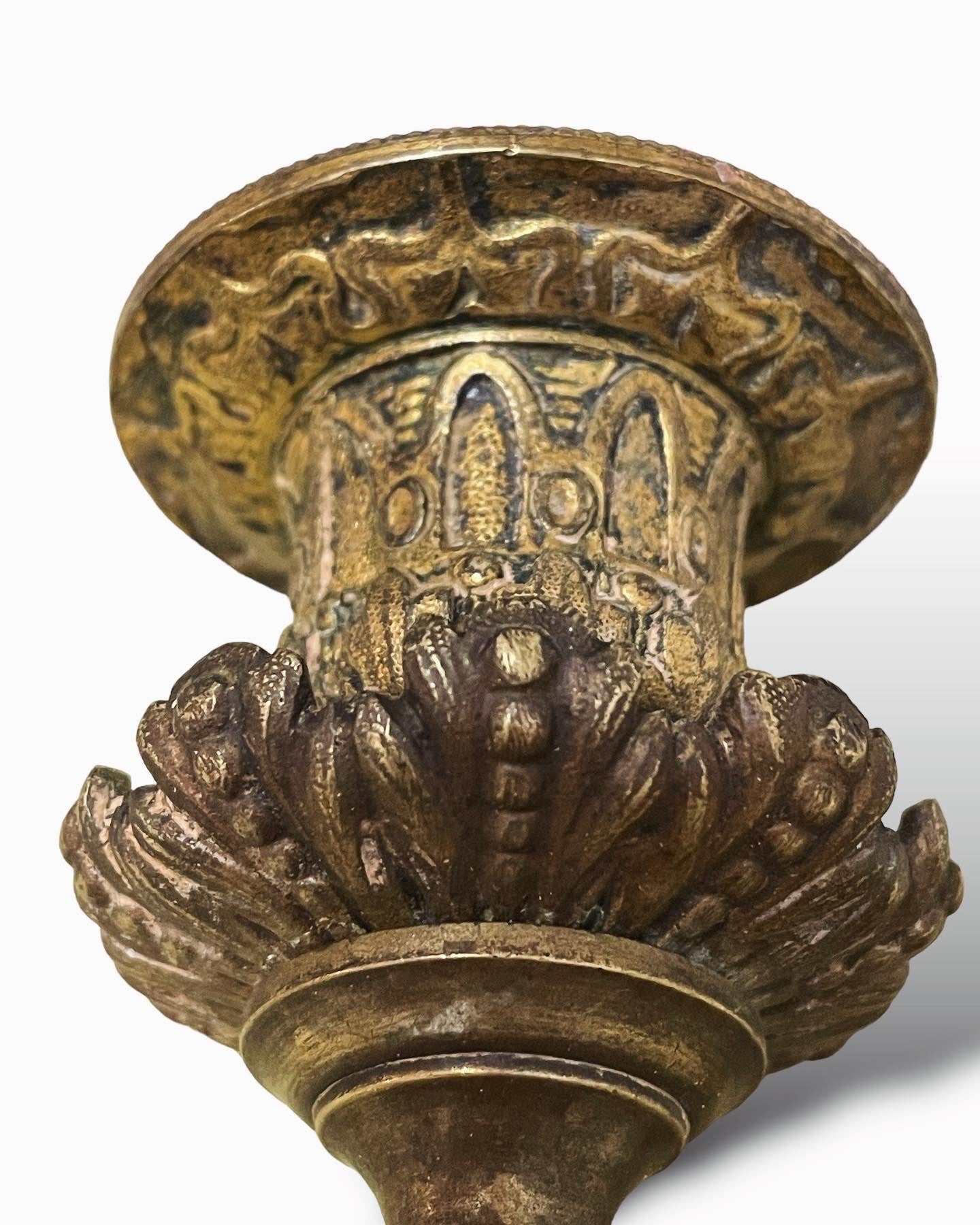 Sacred candlestick with hoofed feet