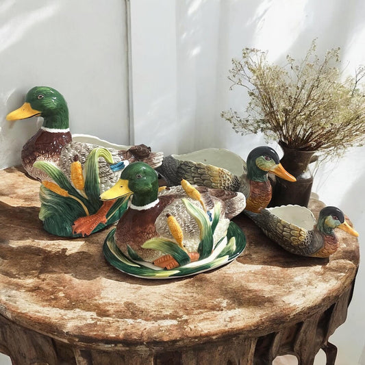 Collection of 4 vintage ceramic ducks