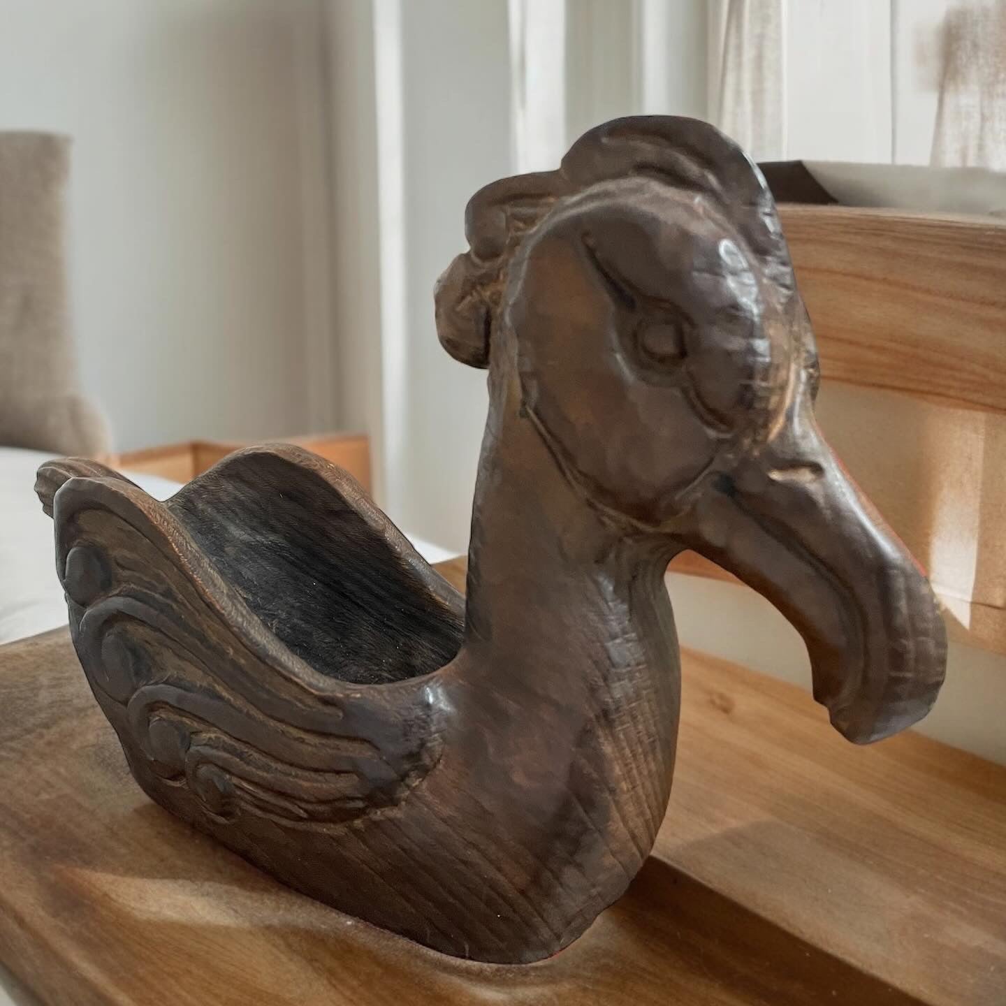 Wooden sculpture of a water bird