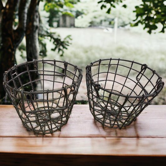 Pair of iron egg baskets