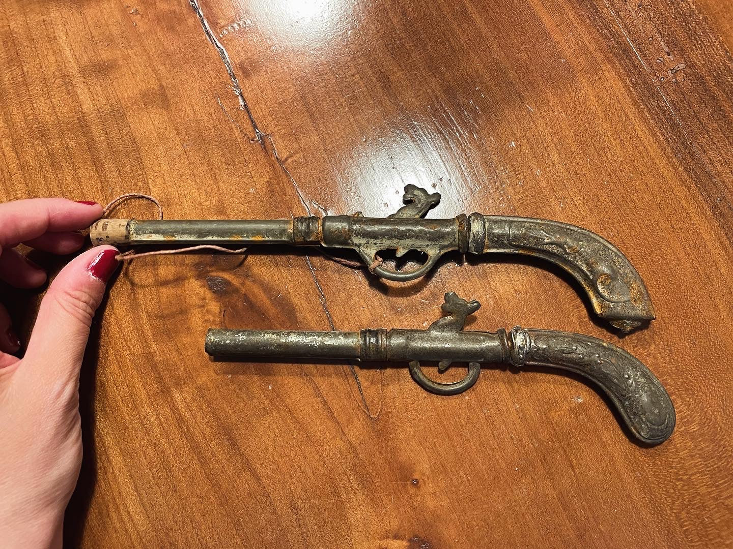 Pair of antique toy guns