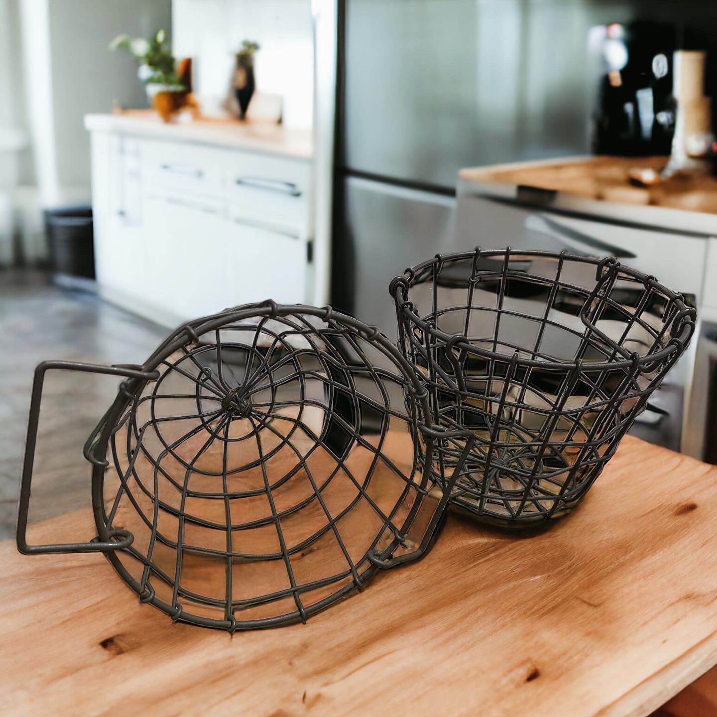 Pair of iron egg baskets