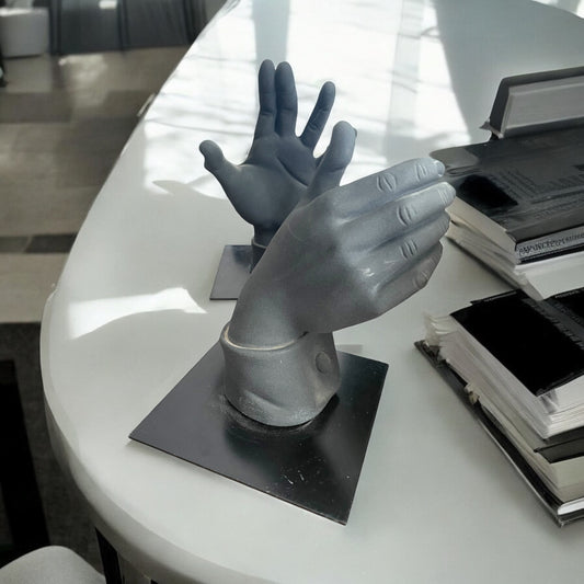Coppia sculture mani Antartidee design, firmate, 1991