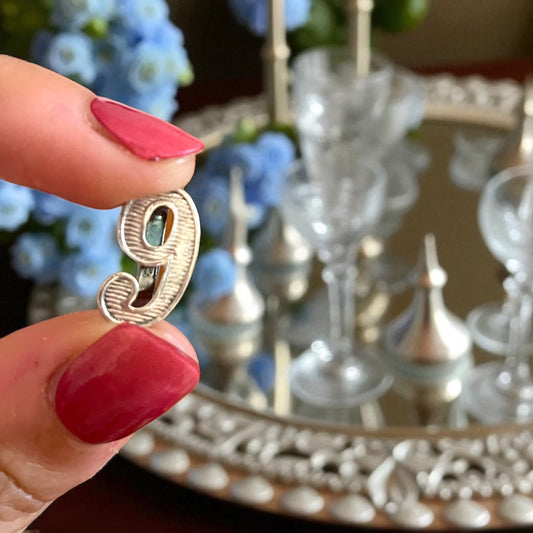 Servizio segna posto cifre per calici, argento 830 in custodia coeva, anni ‘20