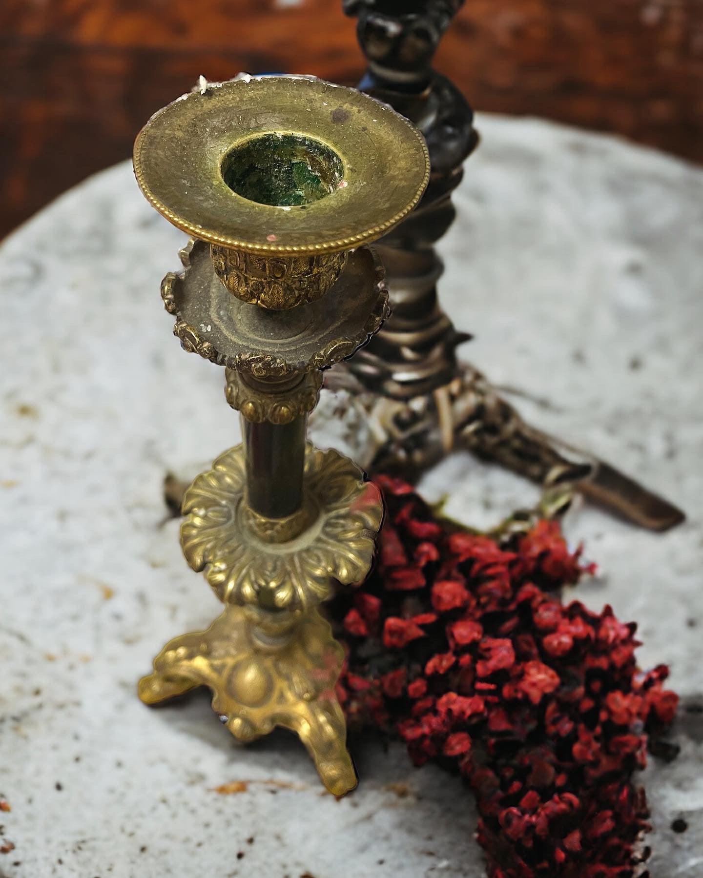 Sacred candlestick with hoofed feet