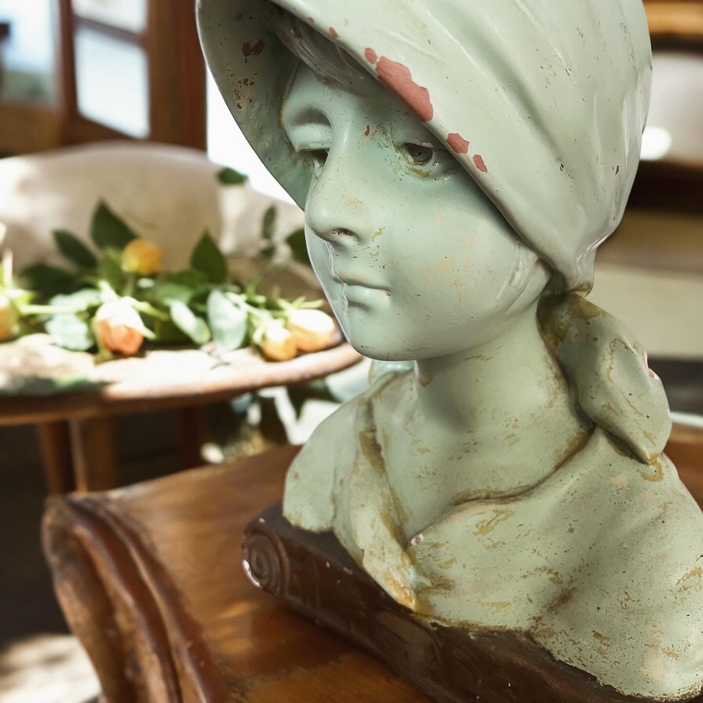 Art Deco bust of a young girl in the village