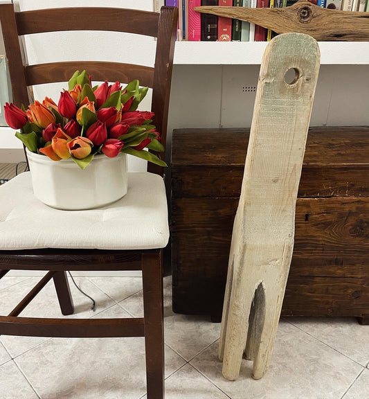 Antico agitatore per panni da lavatoio pubblico