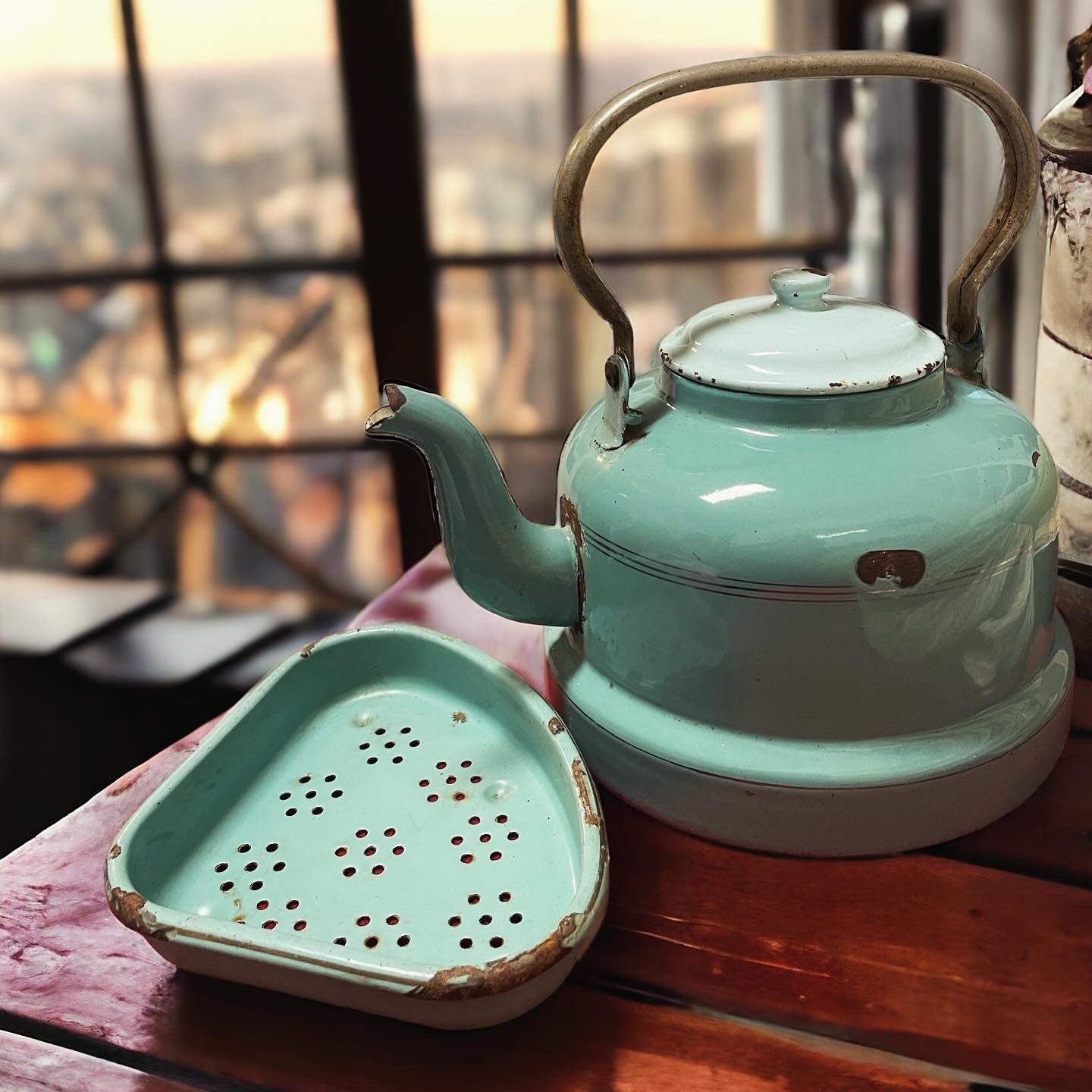 Antique large kettle with strainer