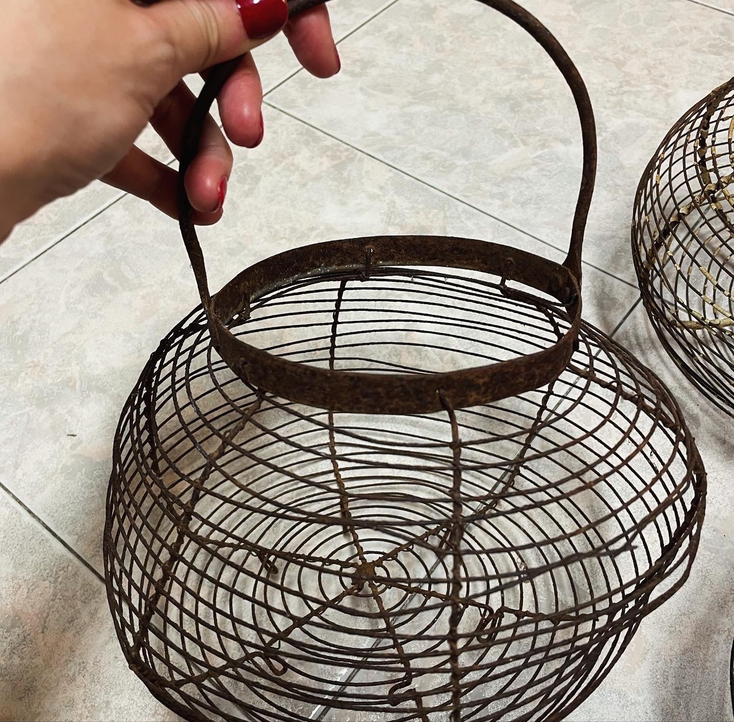 Tris of antique egg baskets