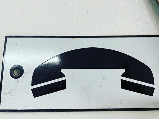 Telephone sign pair