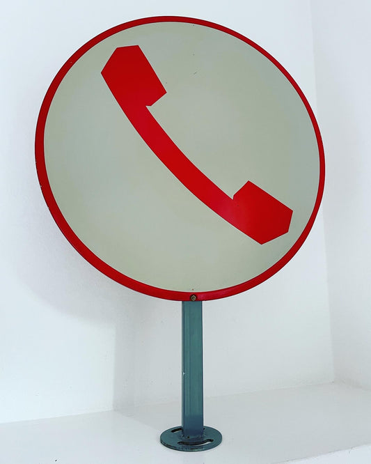 Public telephone sign