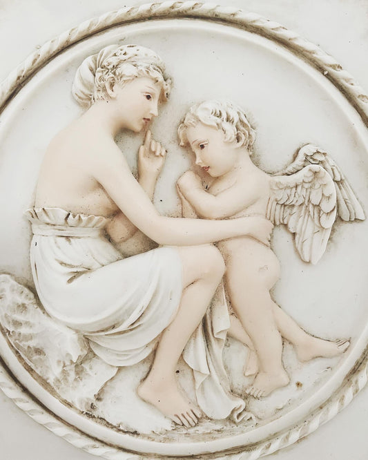 High relief vintage cherubs