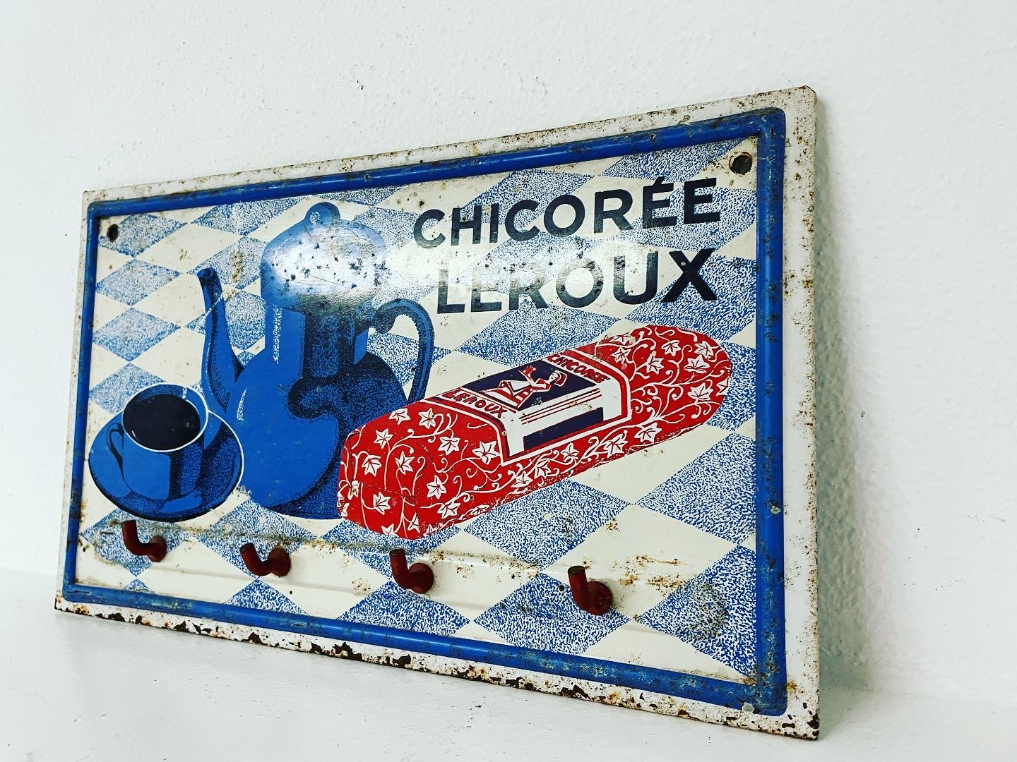 Leroux hanger sign