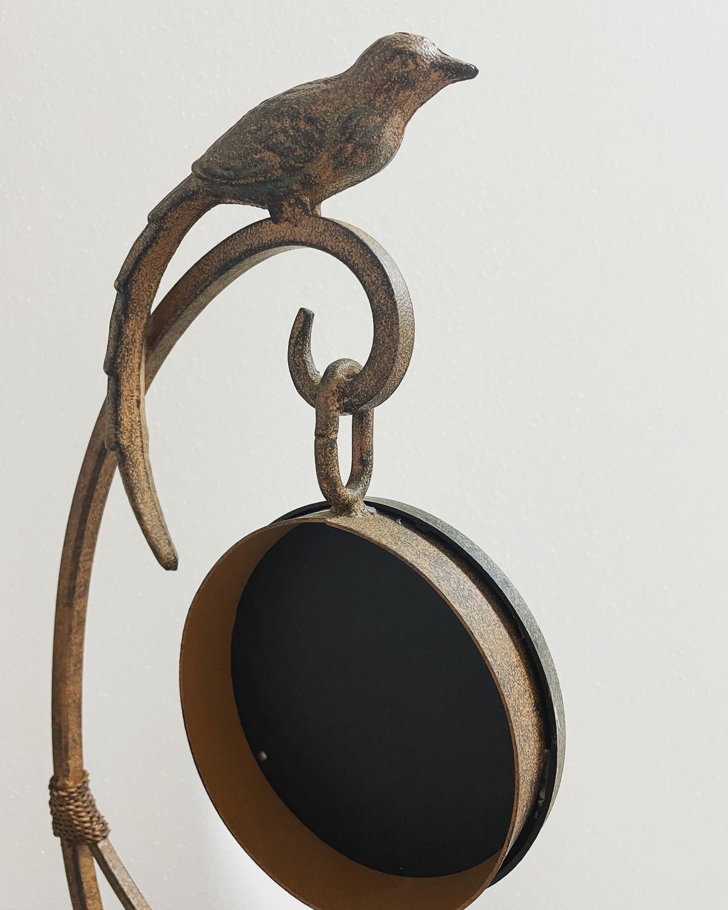 Mirror with bird